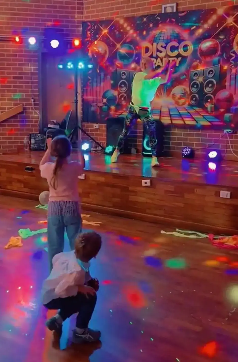 Kids dancing at a disco birthday party