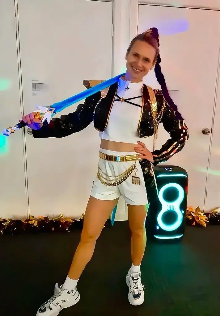 Close view of the Huntr/x costume and party speaker before a K-Pop party