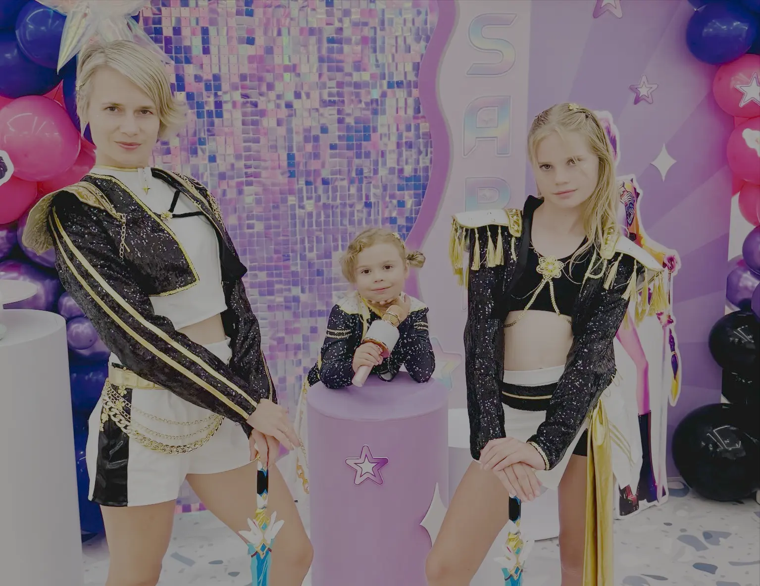 Professional dance party entertainer comes as Rumi from Huntr/x with two children in K-Pop costumes